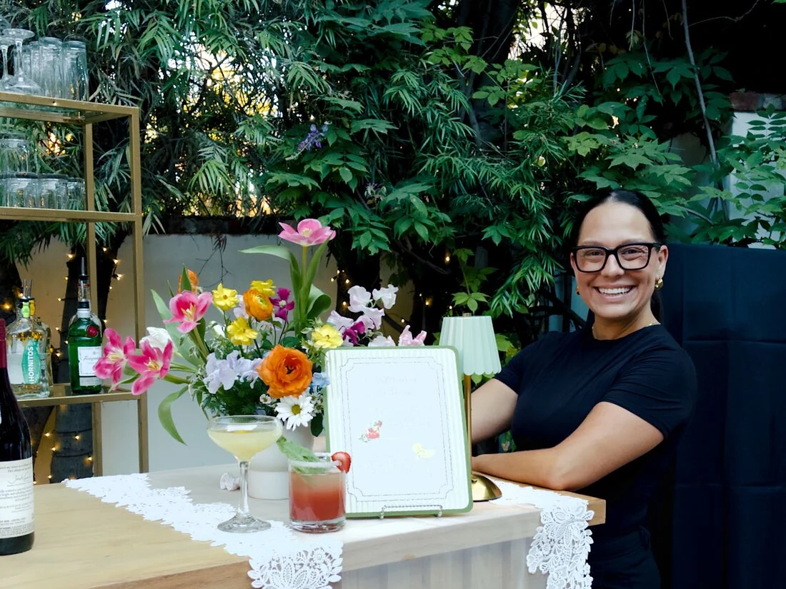 Garden bar styled with spring florals and cocktails